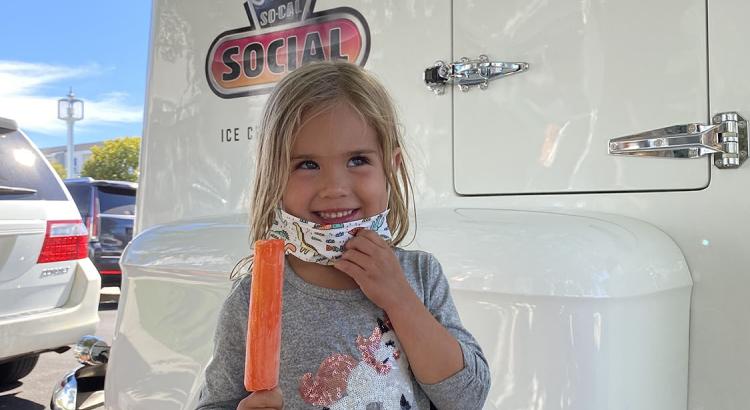 Cute Child with Orange County Ice Cream Event Truck
